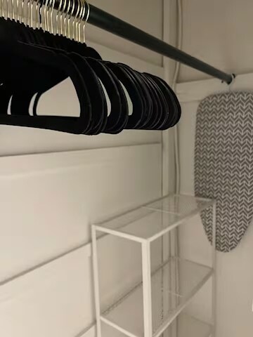 Velvet hangers, ironing board, iron - 5645 Auckland Ave