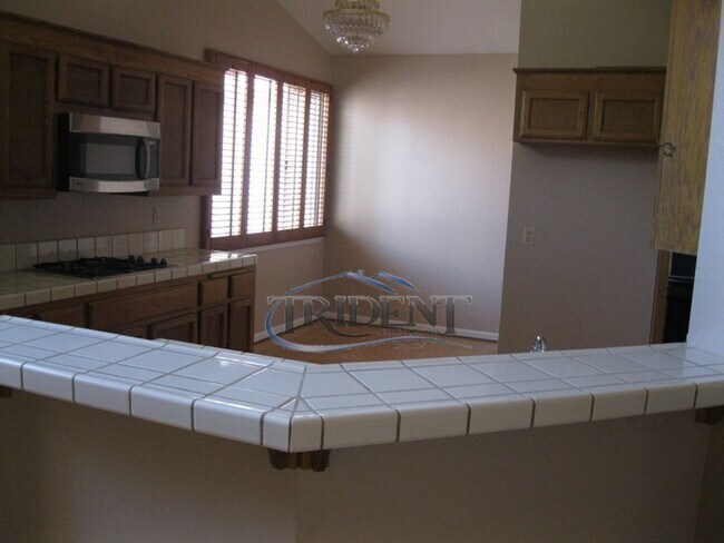 Building Photo - 4 bedroom, 2 bath house with approx. 2,144 square feet