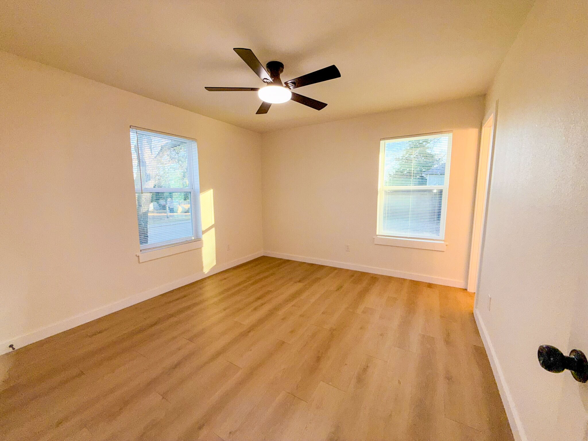 Primary bedroom with half bath. - 308 E Bourn St