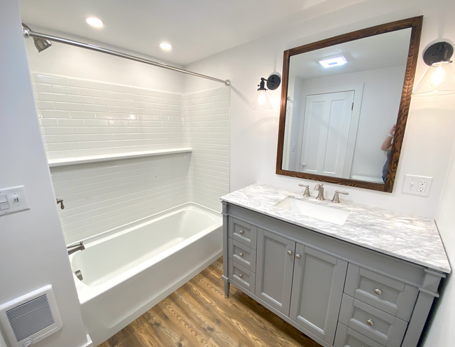 Bathroom with marble-toped vanity - 12 Exeter Rd