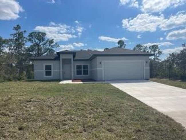 Building Photo - Brand New 4 bed/2 bath Single Family home- Lake Placid