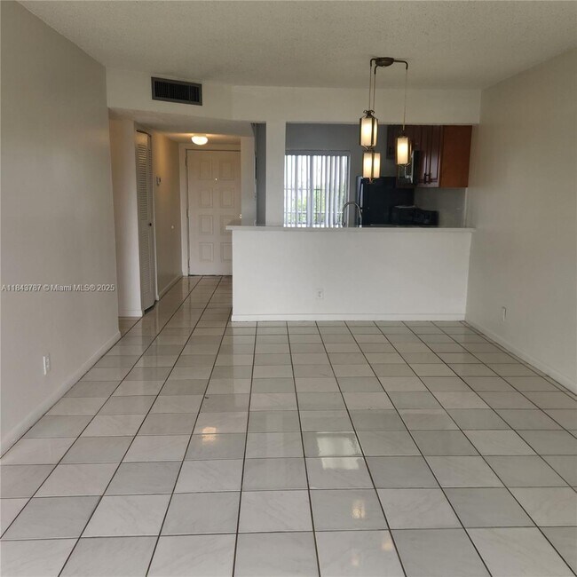 Building Photo - 8550 N Sherman Cir