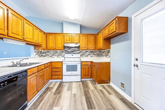 Kitchen (view of back door) - 1313 Montego Ct