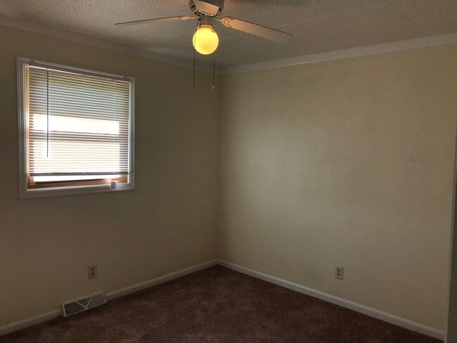 Building Photo - Check Out this Renovated House in a Quiet Neighborhood with a Large Yard!