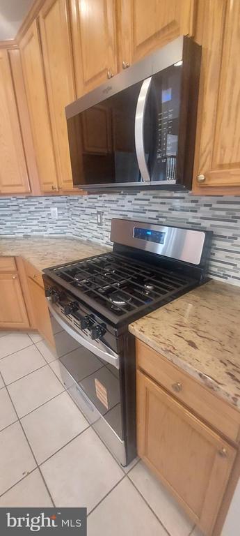 Building Photo - 10210 Sherman Heights Pl