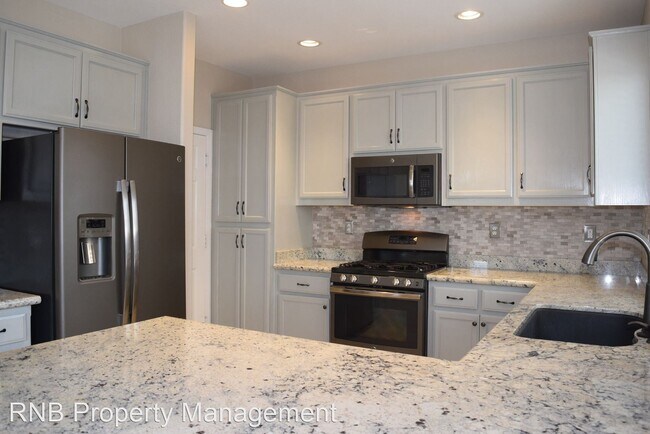 Building Photo - 4 br, 2.5 bath House - 5700 Lavender Court