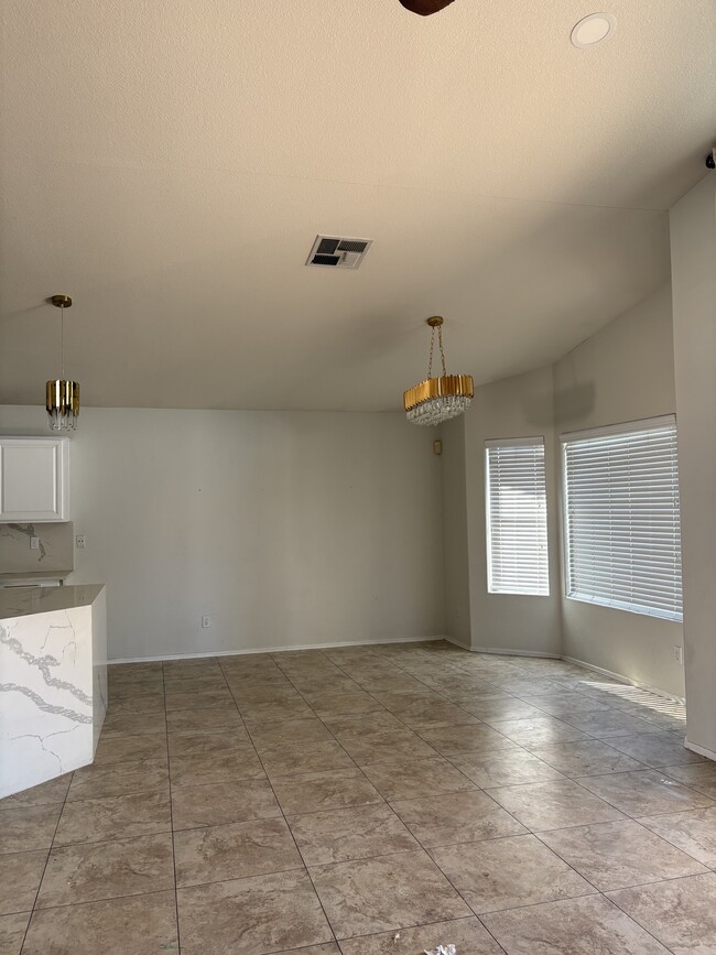 Building Photo - 8456 W Cherry Hills Dr