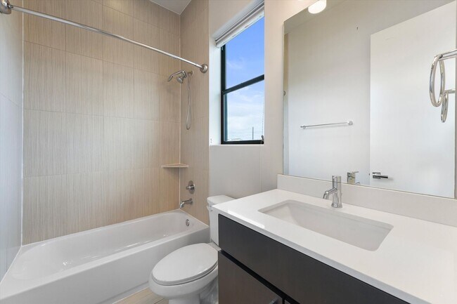 Building Photo - Stunning Freestanding Home with Soaring Ce...