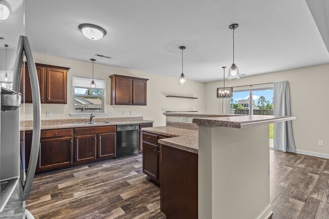 Building Photo - Spacious Home with Natural Light