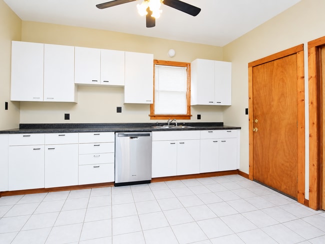 Building Photo - Spacious 2BR + Sunroom Main Floor in NE Arts District – Steps to Logan Park & Breweries