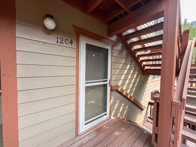 Building Photo - Two-Bedroom Condo with Attached Garage, Available Now