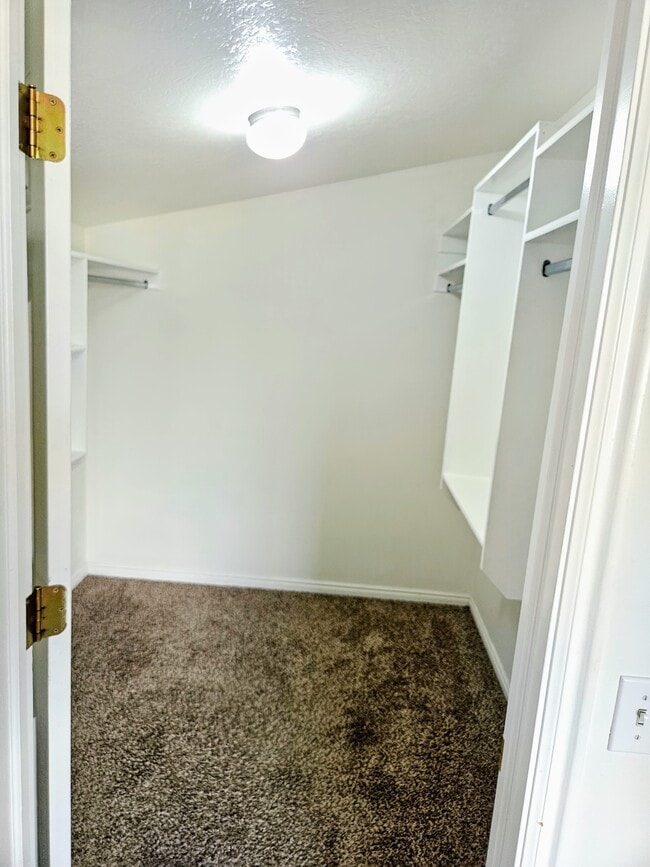 Walk in closet enough for 400 jackets. - 241 Sunstone Cir