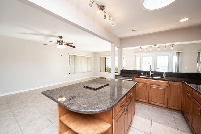 Building Photo - Welcome to this spacious three-bedroom, three-bath home in the heart of Palm Bay