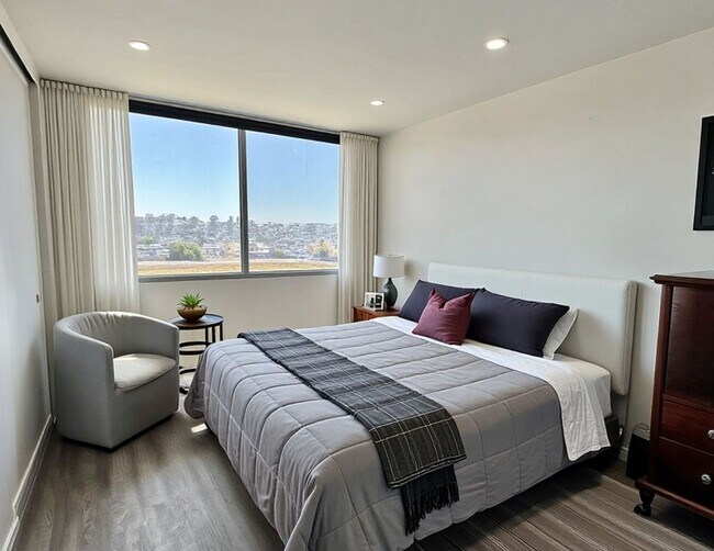 Building Photo - Just Unpack, Pour a Beverage, & Cue the Su...