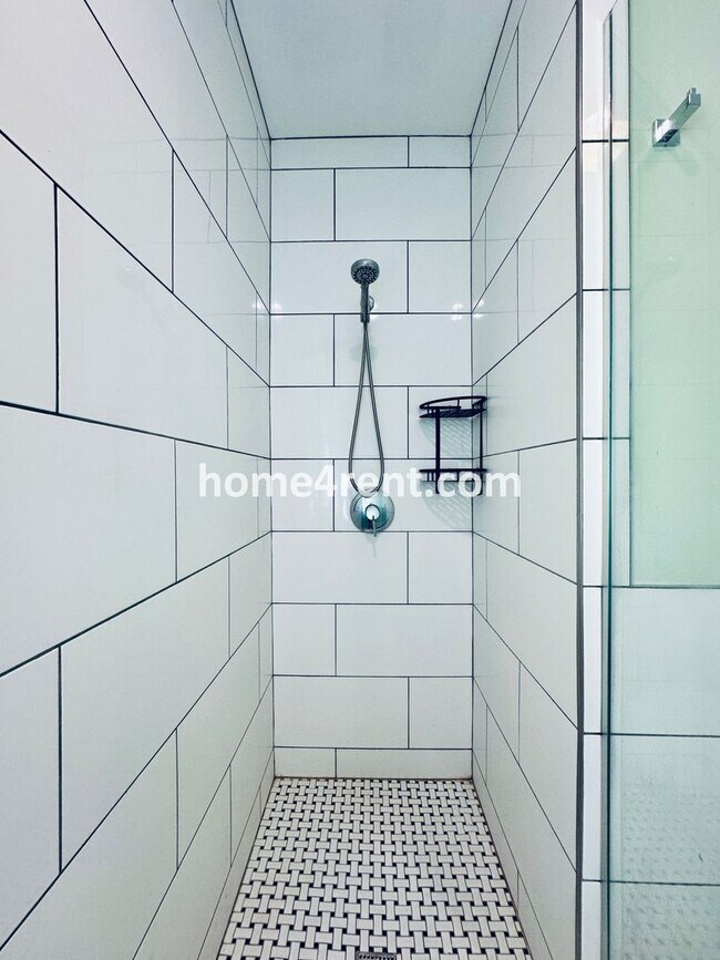 Building Photo - Charming Home Near Country Club Plaza w/ Gorgeous Updates, Wood Floors and a Two Car Garage!