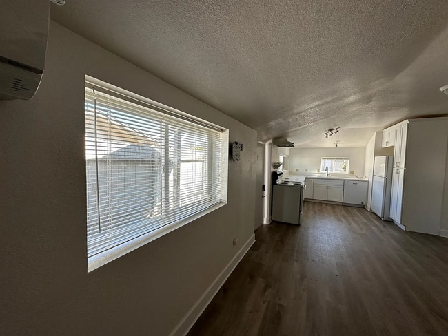 Building Photo - Welcome to this charming, newly remodeled rustic property offering privacy, comfort, and character.