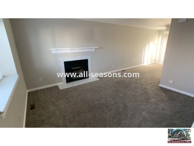 Building Photo - Located near Omaha and Powers, this fully ...