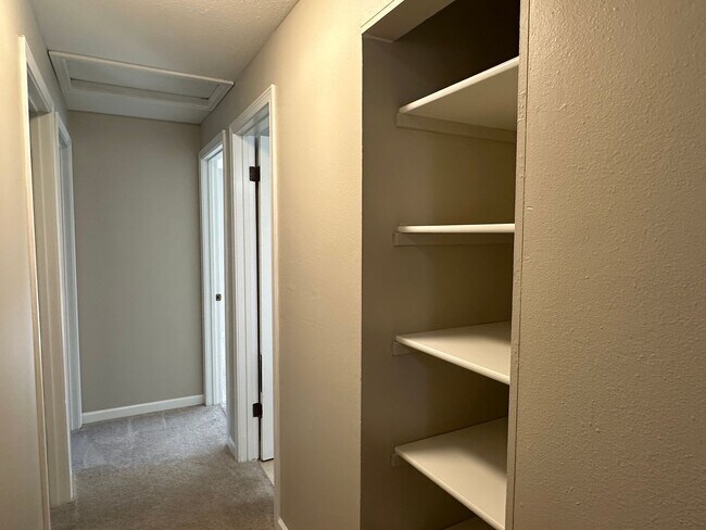 Building Photo - Spacious & Stylish 3BD Home with Iconic Stone Fireplace + Soaking Tub