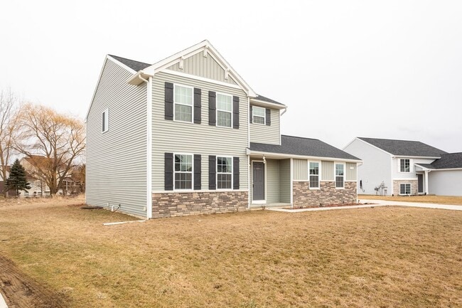 Building Photo - COMING SOON! Spacious 4-Bed Grand Blanc Home with Modern Comfort