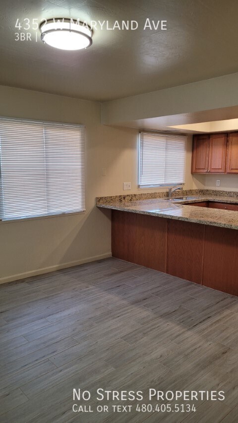 Building Photo - Remodeled 3 Bedroom Townhome off 43rd Ave ...