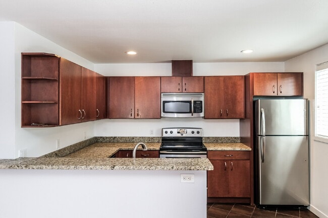 Building Photo - **Updated 2-Bedroom Condo with Secure Parking**