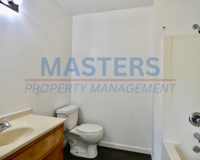 Building Photo - Spacious 4-Bedroom Home with 2 Full Baths & Detached Garage