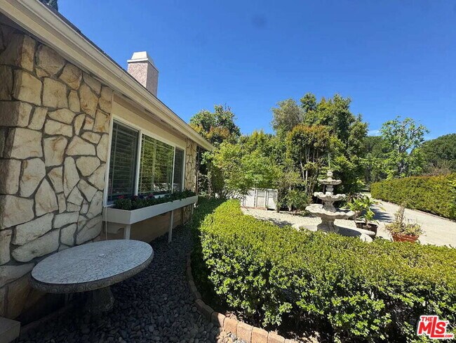 Building Photo - 7814 Woodhall Ave