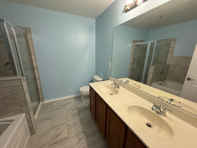 Building Photo - Spacious 2-Level Condominium