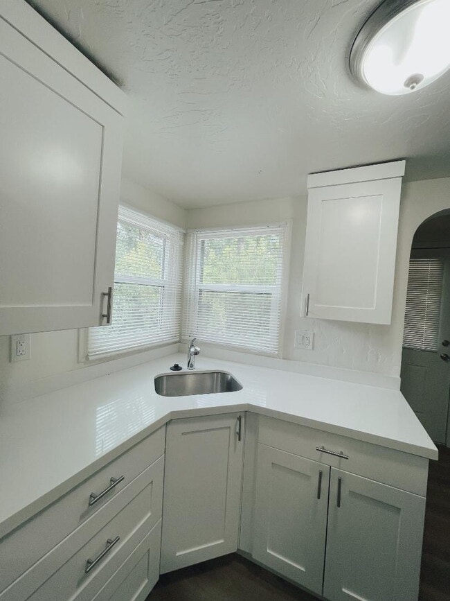 Building Photo - Available Now — 1 BR / 1 BA Creekside Duplex Unit in Millcreek — $1,200/mo