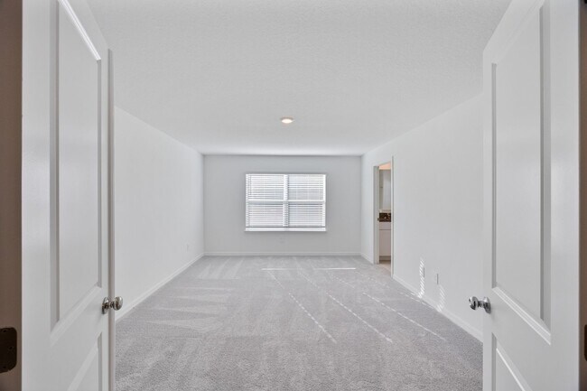 Building Photo - Brand New End Unit Townhome in Angeline Co...