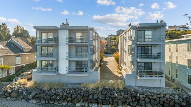 Building Photo - Stunning ALKI WATERFRONT Condo Overlooking Majestic Puget Sound!