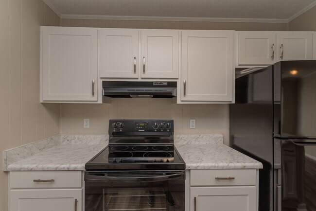 Building Photo - $950 - Updated 2 Bed/1 Bath Duplex With Stainless Steel Appliances!