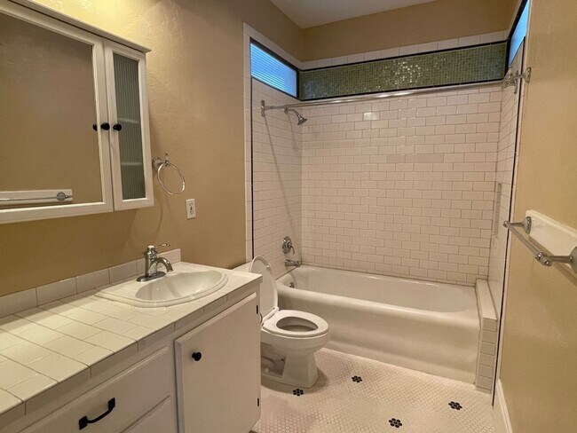 Building Photo - Urban DREAM! Spacious 1-Bedroom w/ Exposed Brick, Fireplace, & More in a Hip Location!