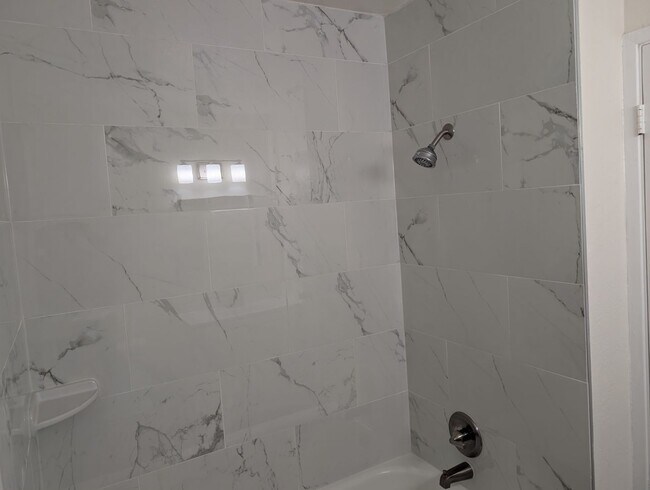 Building Photo - Completely remodeled and updated condo close to Fresno State and shopping. *Ask about the Move-in...