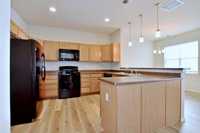 Ample Maple cabinetry in kitchen - 6349 Orchard Park Dr