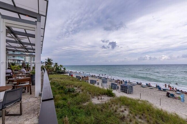 Building Photo - 4010 S Ocean Dr