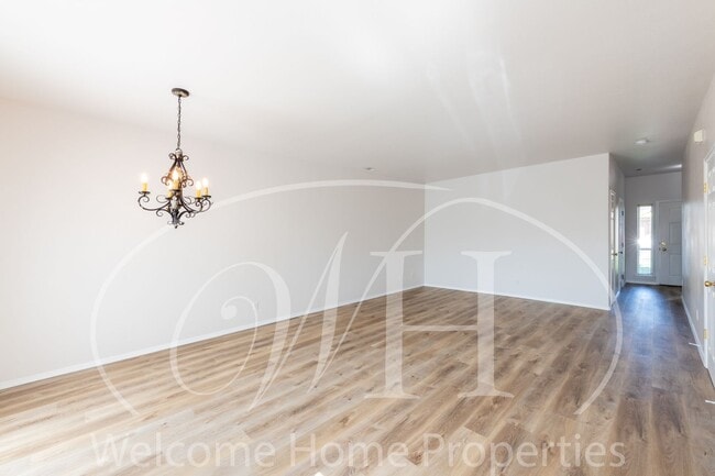 Building Photo - Enjoy the Open Floor Plan and Generous Storage in this College Place Duplex