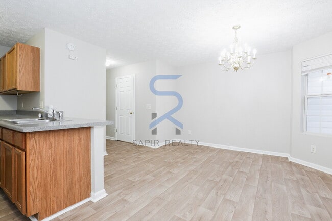 Building Photo - Move in before February 15th and choose your reward: a $250 Amazon Gift Card or a 55" Smart TV!