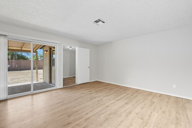 Building Photo - Three bedrooms plus big garage!