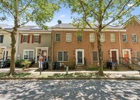 Building Photo - Spacious 3BR Townhome Near Metro & Nationa...