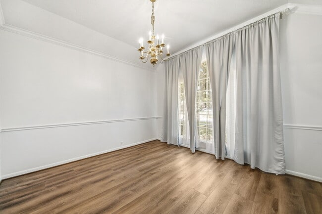 Building Photo - Peaceful Single-Story Home with Updated Flooring & Included Appliances