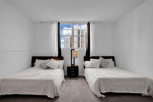Building Photo - 19370 Collins Ave