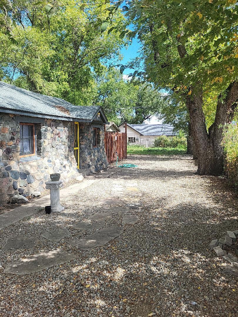 side yard and garage at end - 703 N Walnut St