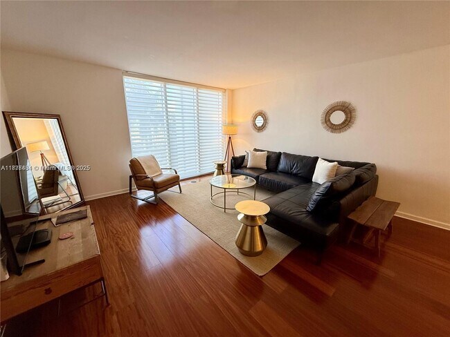 Building Photo - 10275 Collins Ave