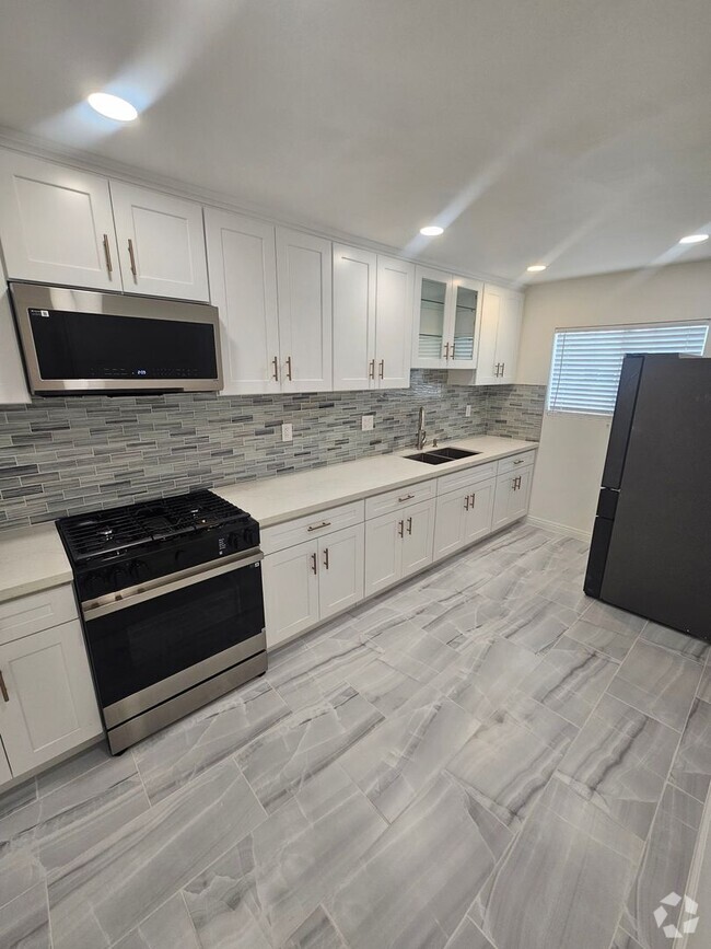 Building Photo - Bellflower Blvd #2
