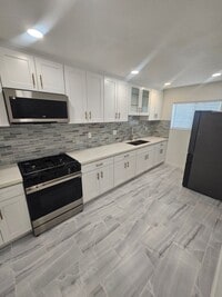 Building Photo - Bellflower Blvd #2