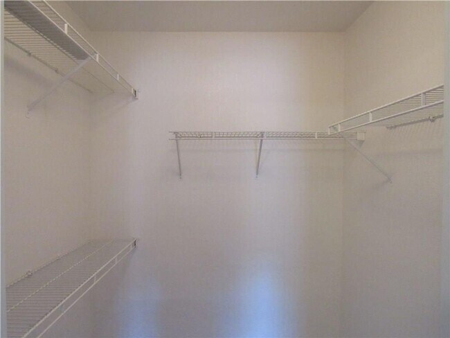 Building Photo - COZY 2 BEDROOM 2 BATH IN GATED SW COMMUNITY!