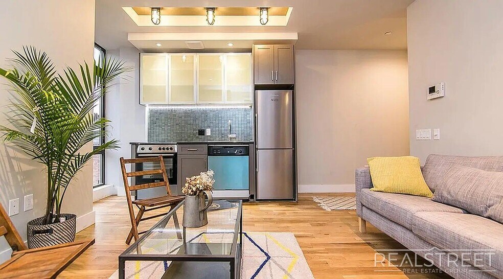 Building Photo - Bright 2 Bed / 1 Bath Loft-Style Residence with Multiple Balconies & Premium Amenities