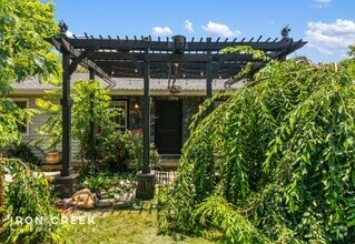 Building Photo - Beautifully Updated Three-Bedroom with Koi...