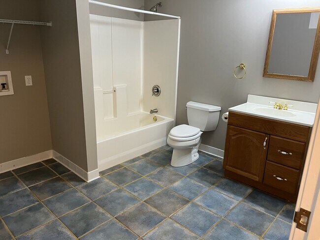 full bathroom with washer/dryer hook-ups - 215 Kirkton Knls